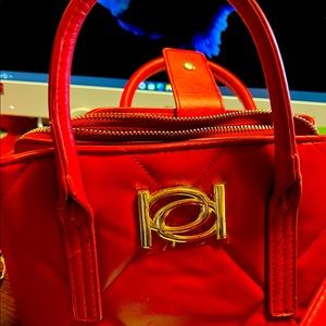 Babe original Red leather purse w/ shoulder strap used 1 day.